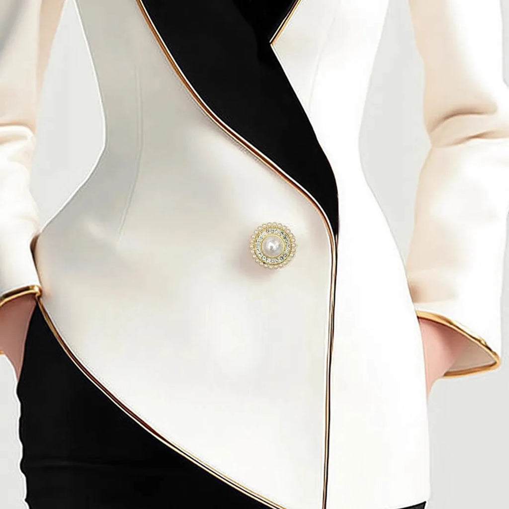 Beige women's irregular design long sleeve coat with golden edge pearl buttons on the front.
