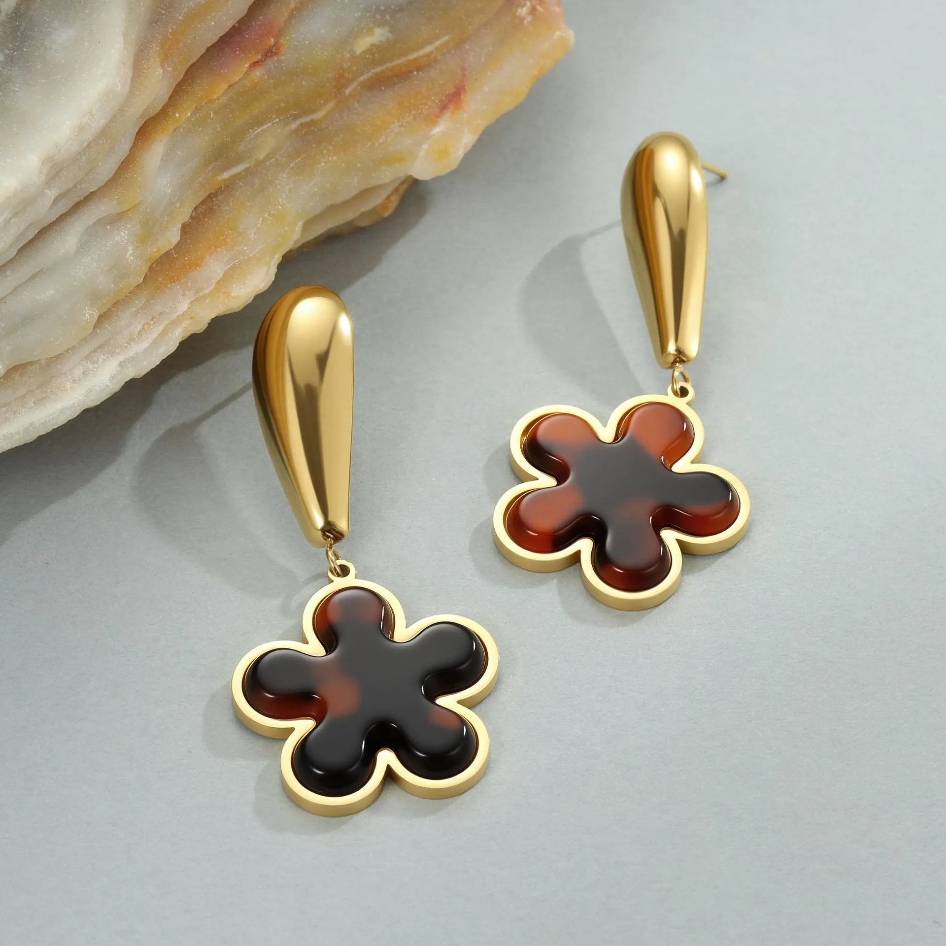 Tortoiseshell resin hawksbill colour earrings with stainless steel construction and geometric designs