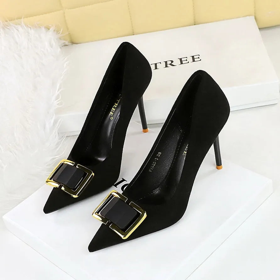 Black suede women's stiletto high heels with 9cm heel and shallow open toe on a neutral background