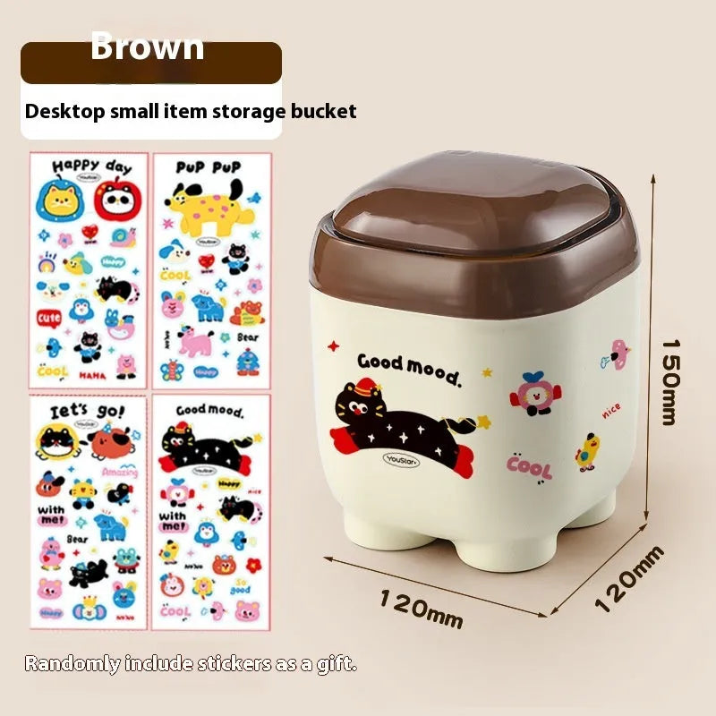 Cartoon-style red and brown plastic desktop storage box with grid compartments for organising pens and stationery.