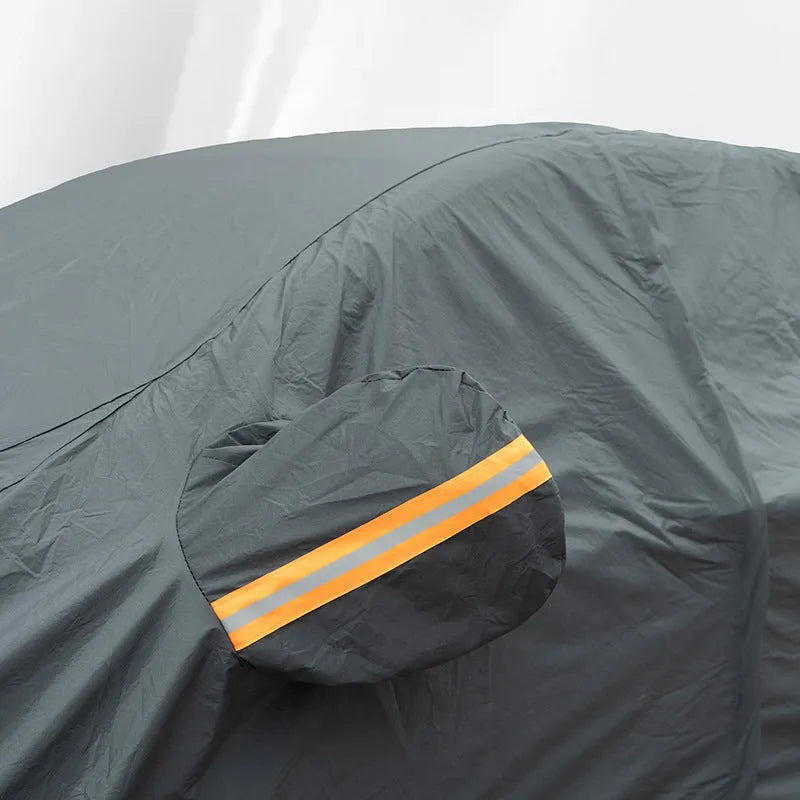 Grey Volkswagen car cover with rainproof sun protection features shown fitted on vehicle