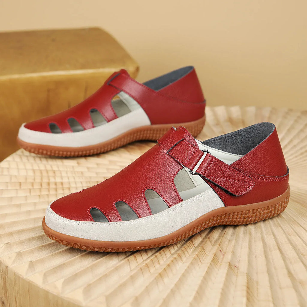 Plus size women's flat sandals with hollow-out design and toe cap in blue, red, or white.