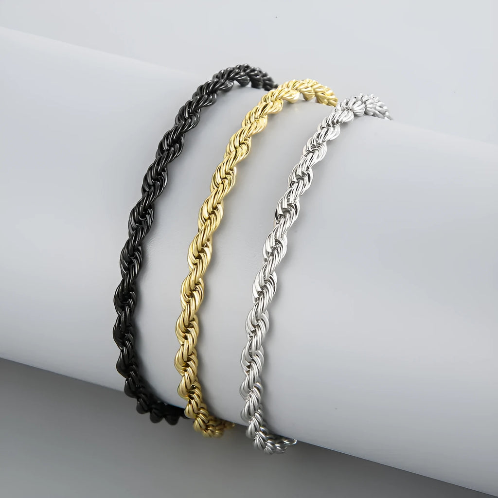 Gold double colour twist chain titanium steel bracelet with geometric design on white background
