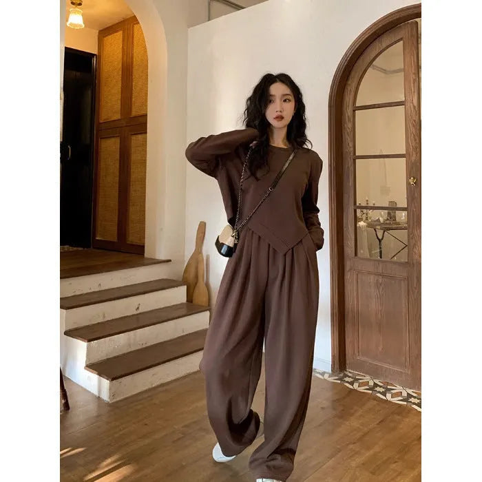 Women's khaki coloured loose-fitting sports suit with long sleeve top and full length trousers