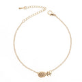 Women's alloy bracelet featuring a central pineapple charm in gold or silver colour.