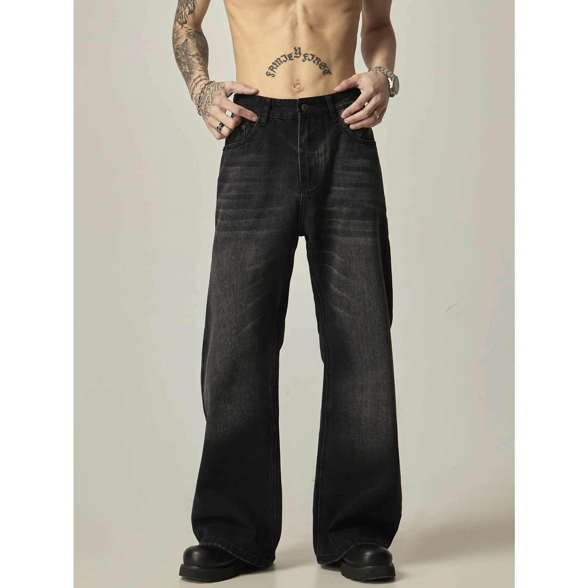 Black loose straight leg men's jeans with retro styling and zipper fly