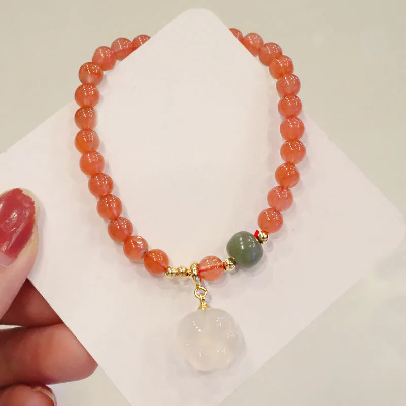 Natural red agate bracelet with jade and cat paw motif polished 6mm beads