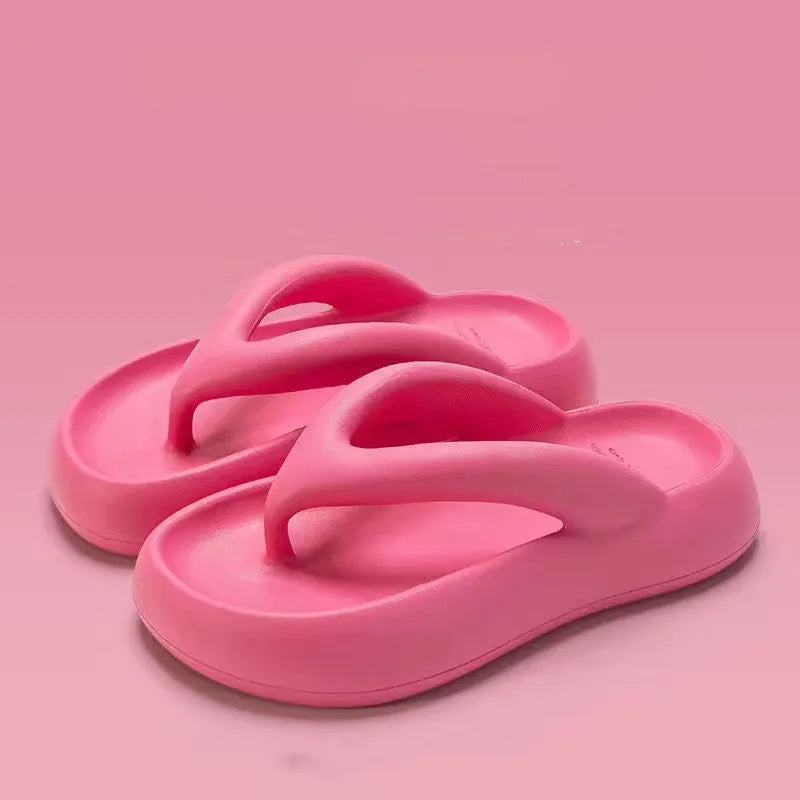 Solid colour thick-soled EVA flip-flops with decorative bow on strap.