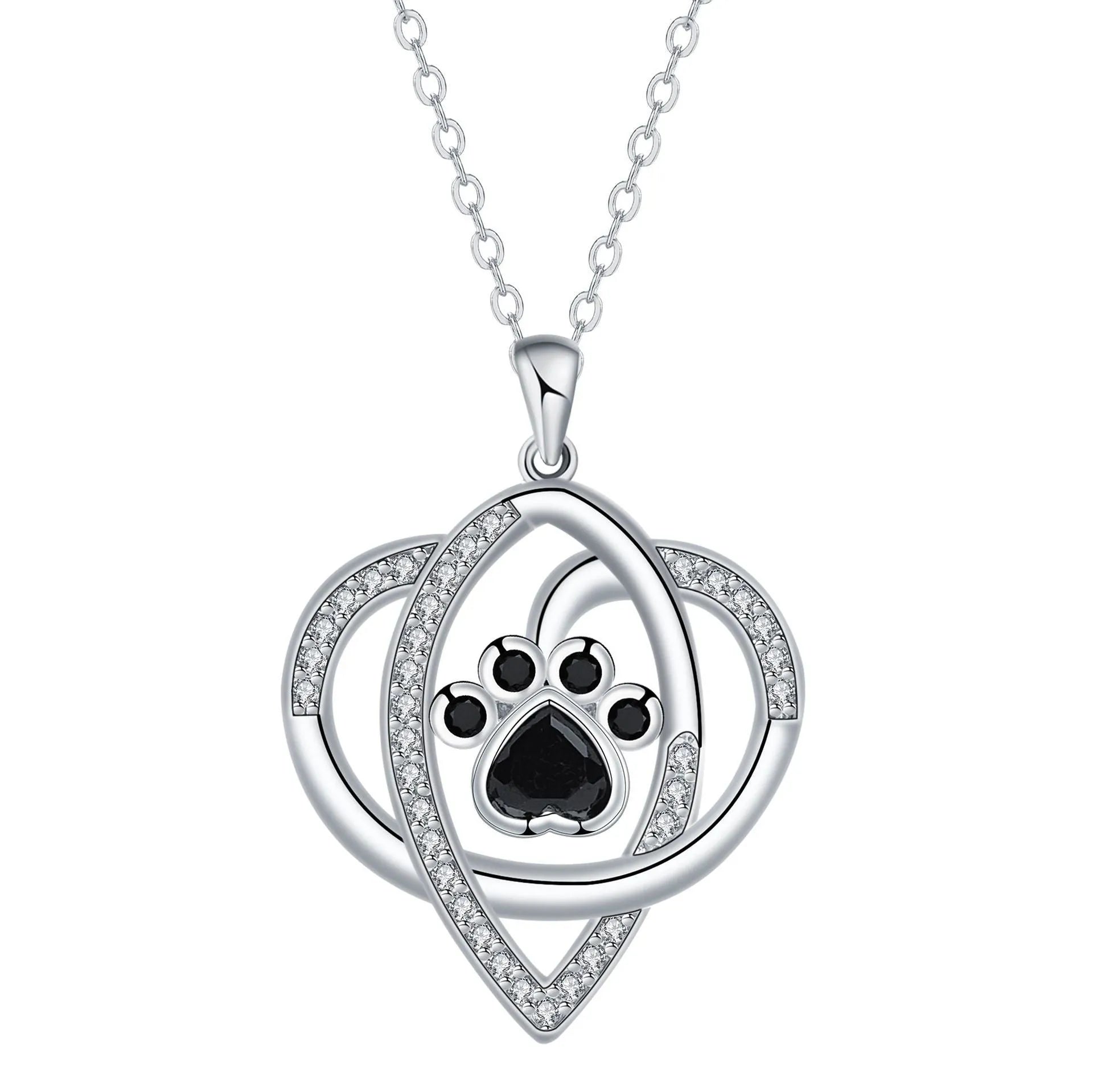 Close-up of a women's copper necklace with a dog paw print pendant on a cross chain.