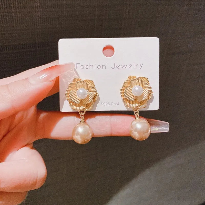 Gold electroplated Hong Kong style flower stud earrings with rose pearl opal centre and ice flower detailing