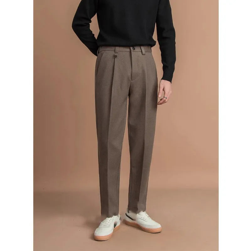 Men's straight-leg casual suit trousers in black, shown with a draped fit.