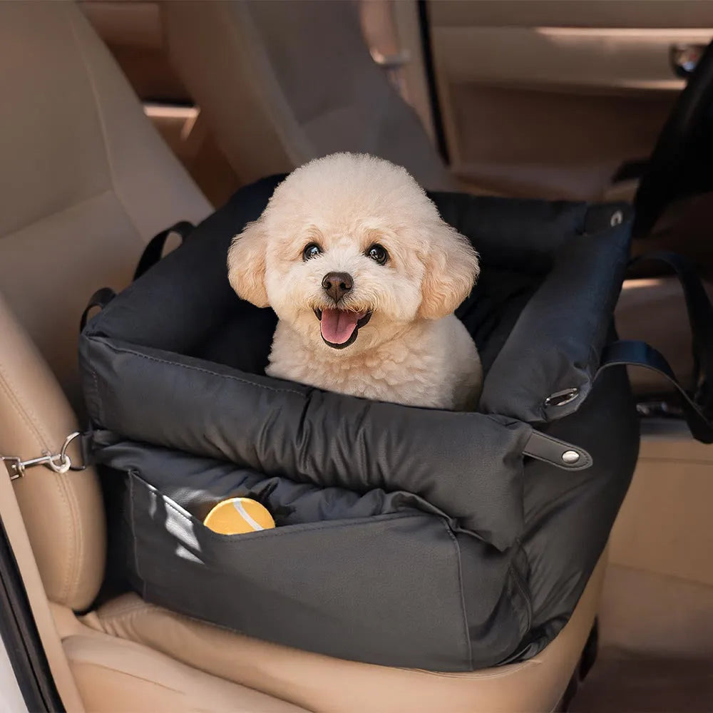 Green waterproof PU leather dog car nest with removable cover, shown in a car footwell.