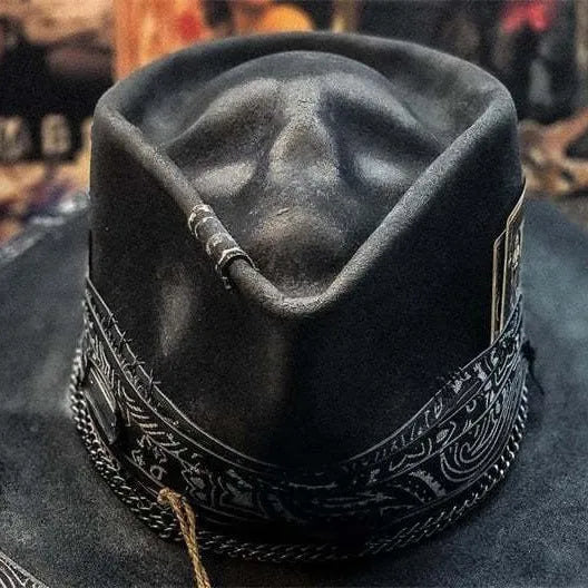 Handmade wool felt conical hat with skull design showing conical silhouette and wool texture