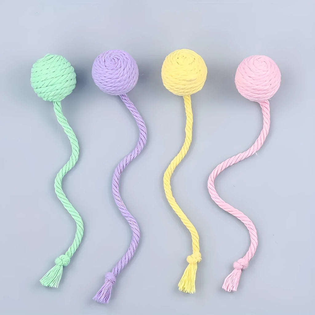 Colourful cat toy ball with rope and built-in bell available in green pink purple yellow for kittens