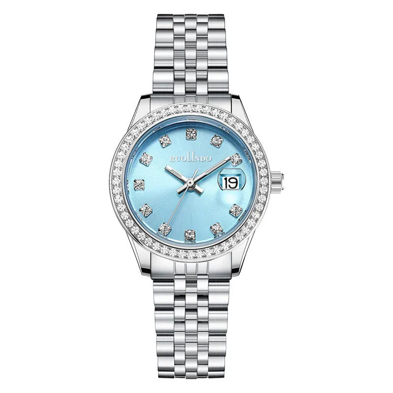 Women's silver calendar watch with circular dial showing date function and stainless steel buckle