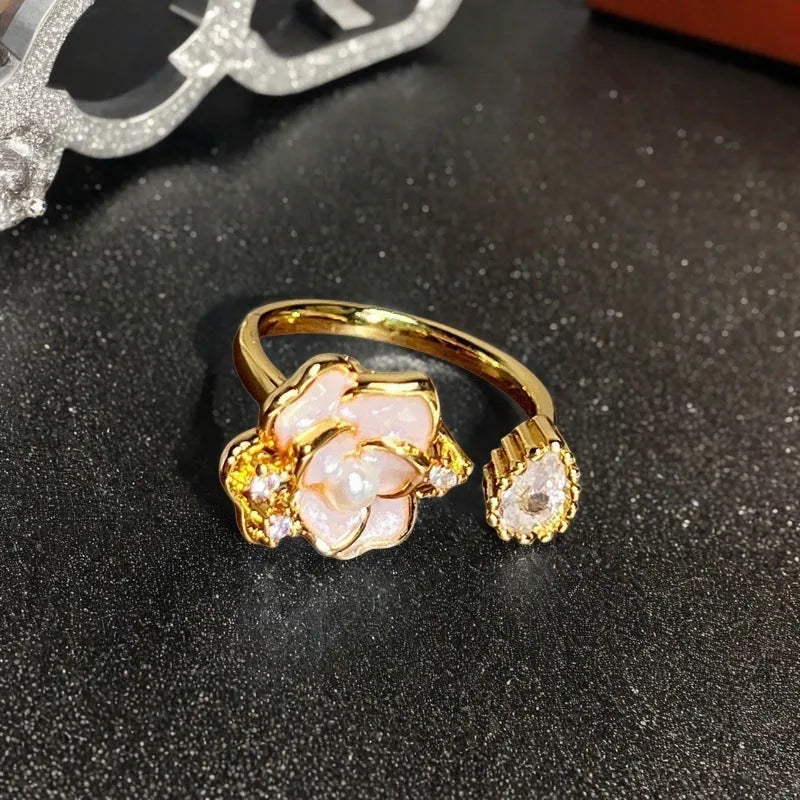 Adjustable gourd vintage ring with oil dripping finish in New Chinese style showing bow-shaped elements and zircon details