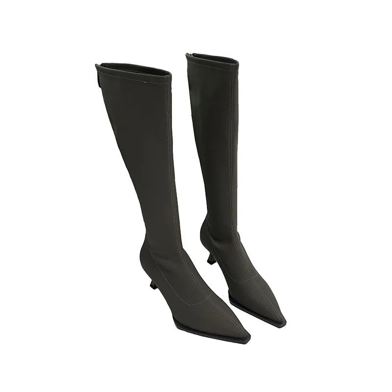 Women's black pointed toe stiletto heel boots with a back zip closure