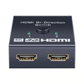 HDMI switcher 2 in 1 out black compact plug and play with one-click switching button