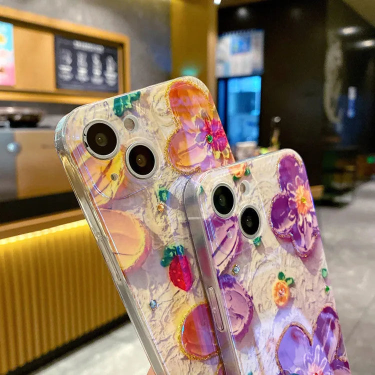 Purple soft rubber phone case with oil painting flower design and inlaid diamond detailing.