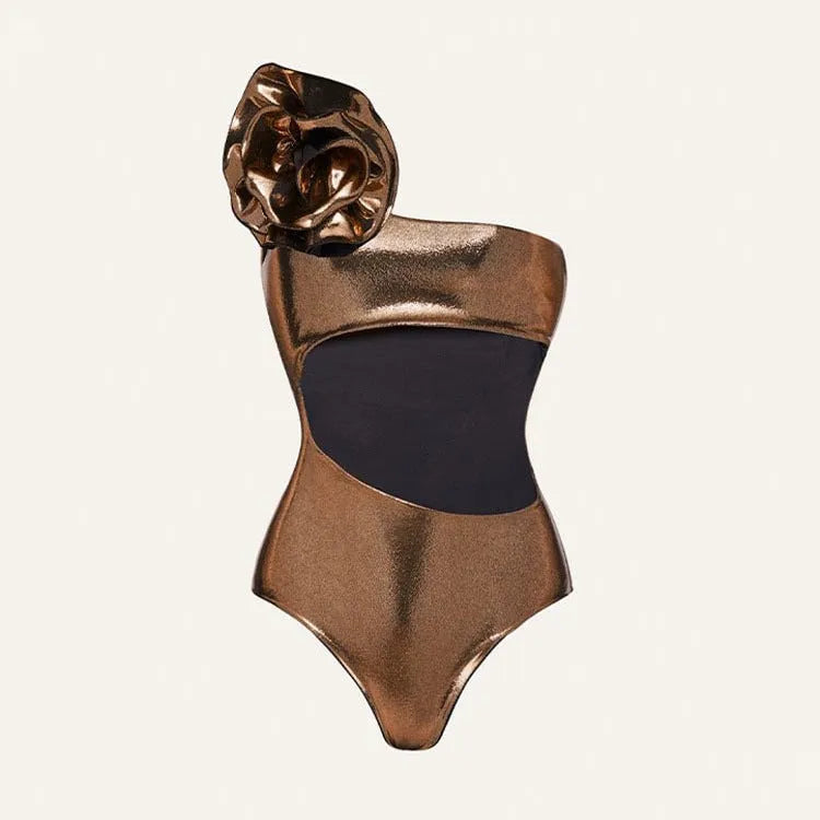 Gold coloured handmade one-piece swimsuit with a halter neckline and hollow-out design.