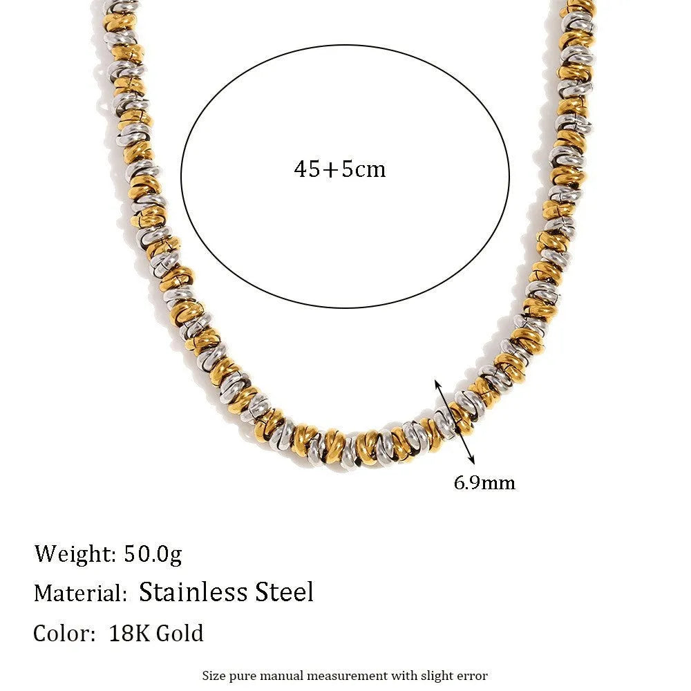 Gold geometric circle design jewellery set with earrings, necklace and bracelet