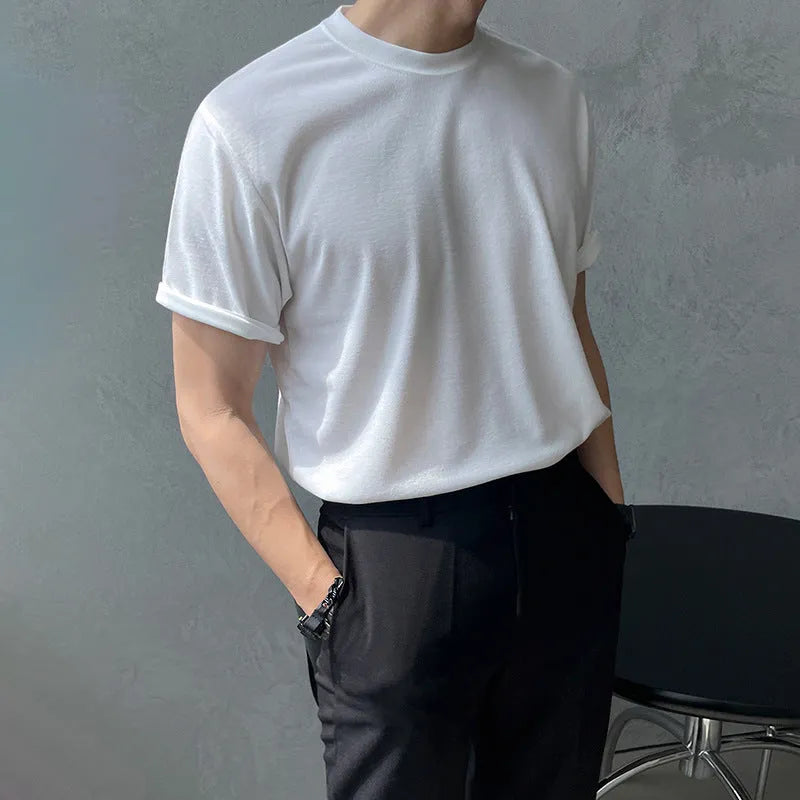 Men's slim fit cotton t-shirt in solid white or black with half sleeves and round neck