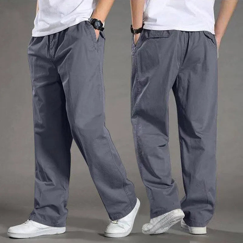 Men's cotton loose straight trousers zip placket workwear style, black colour, on model