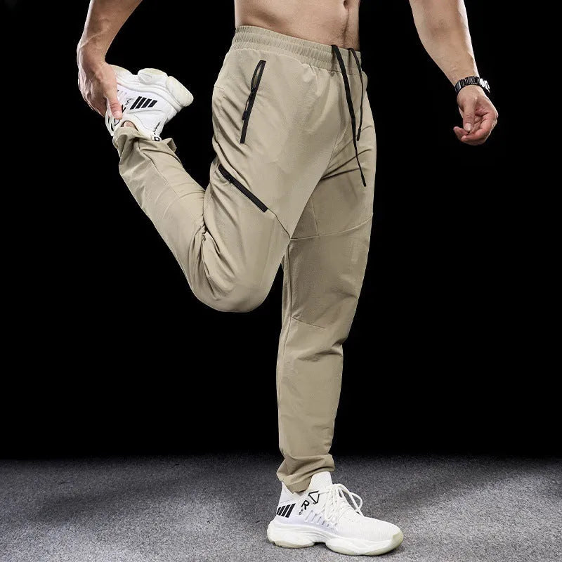 Men's waterproof workout pants in quick-drying nylon fabric for sports and fitness activities