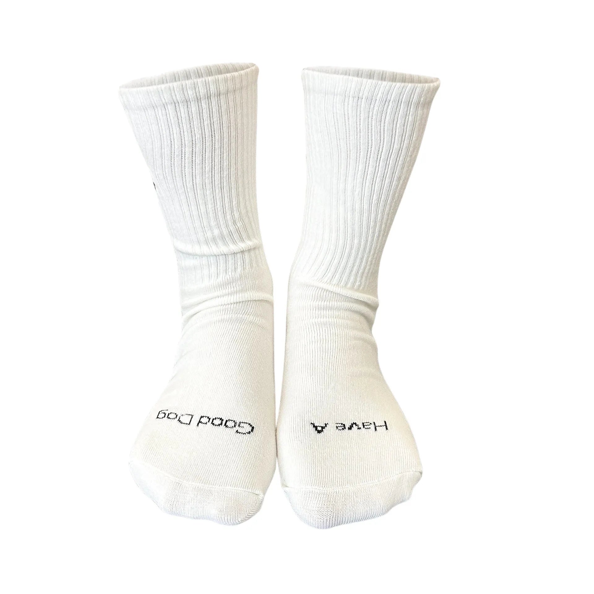 White cotton tube socks with printed Corgi dog pattern on a white background