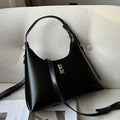 Genuine leather dumpling-shaped crossbody bag in apricot colour with an outer sandwich pocket