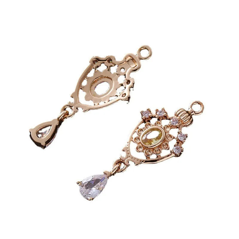 Crown-shaped water drop pendant with hollow design and micro-inlaid zircon stones