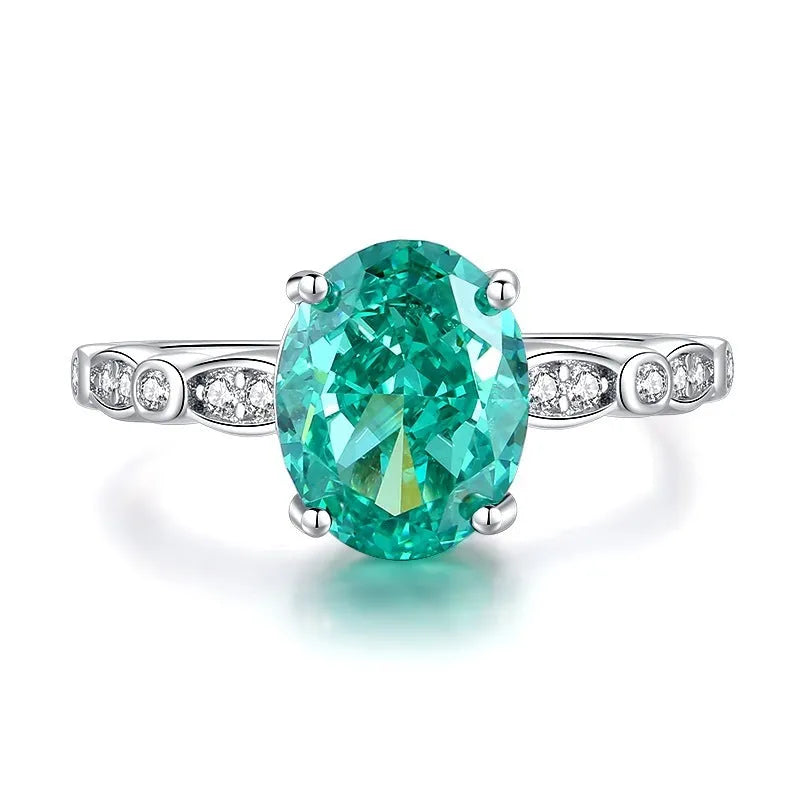 S925 sterling silver ring for women with a green emerald stone set using Palaibahao inlay and diamond accents.
