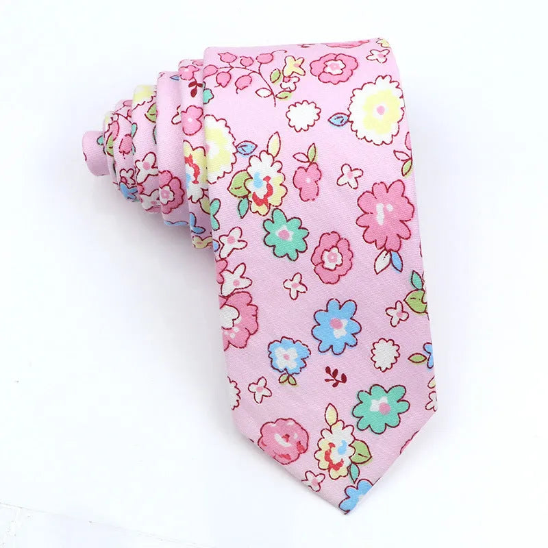 Narrow cotton bow tie with a printed cartoon pattern in a selection of colours.