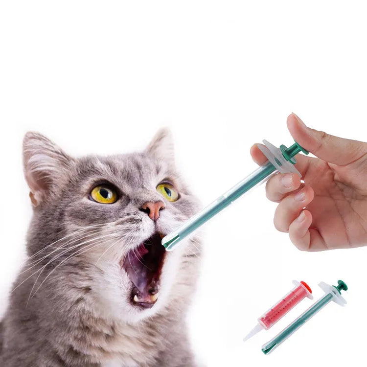 Two pet pill shooters with soft silicone tips for administering medication to cats and small dogs