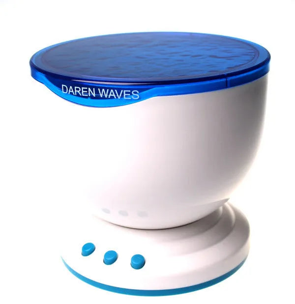 Blue ocean theme LED projection lamp for children's rooms on a table.