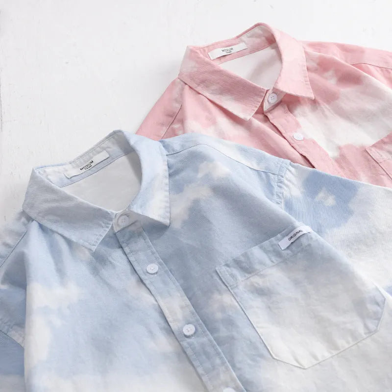 Man modelling a light pink loose-fitting pure cotton short-sleeved cardigan shirt.