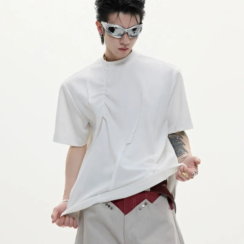 Men's grey cotton T-shirt with pleated detail and a round neck on a hanger.