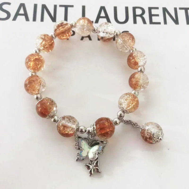 Chinese style glass bracelet with bamboo joint details in a red Lvzhu Duobao design.
