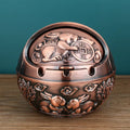 Creative alloy ashtray in bronze with smoke extinguishing slot, featuring a detailed Money Tree design.
