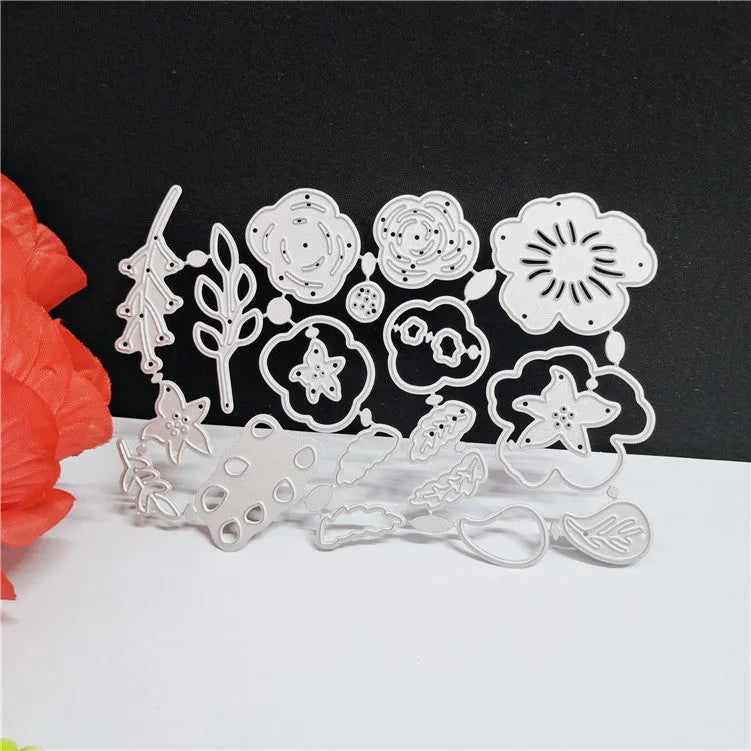 Silver carbon steel flower cutting die for paper crafts measuring 14.3 by 9.9 cm