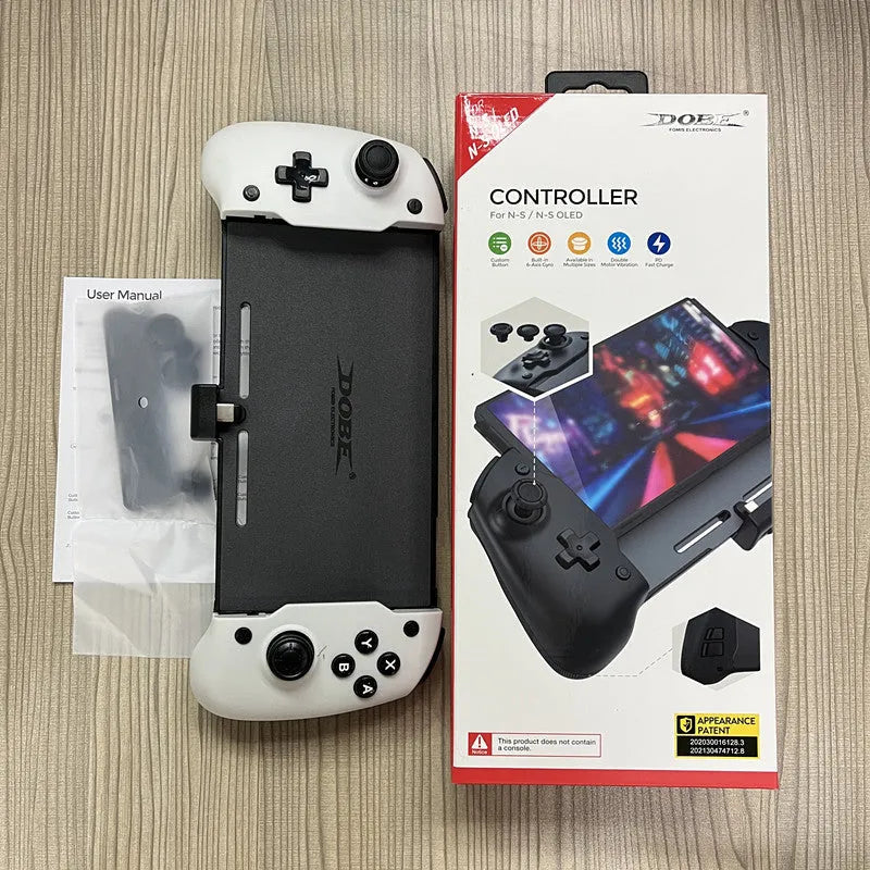 Black and white portable Nintendo Switch gamepad controller showing USB-C port.