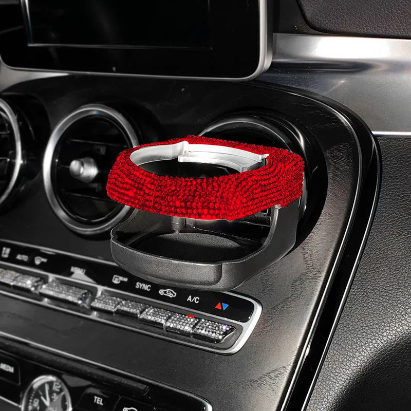 White rhinestone-decorated car cup holder bracket mounted on a car air vent
