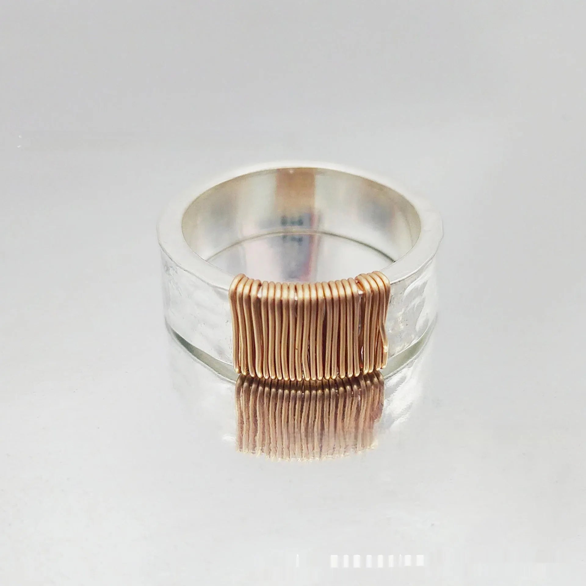 Geometric copper ring bracelet with irregular coil design in silver or gold electroplated finish