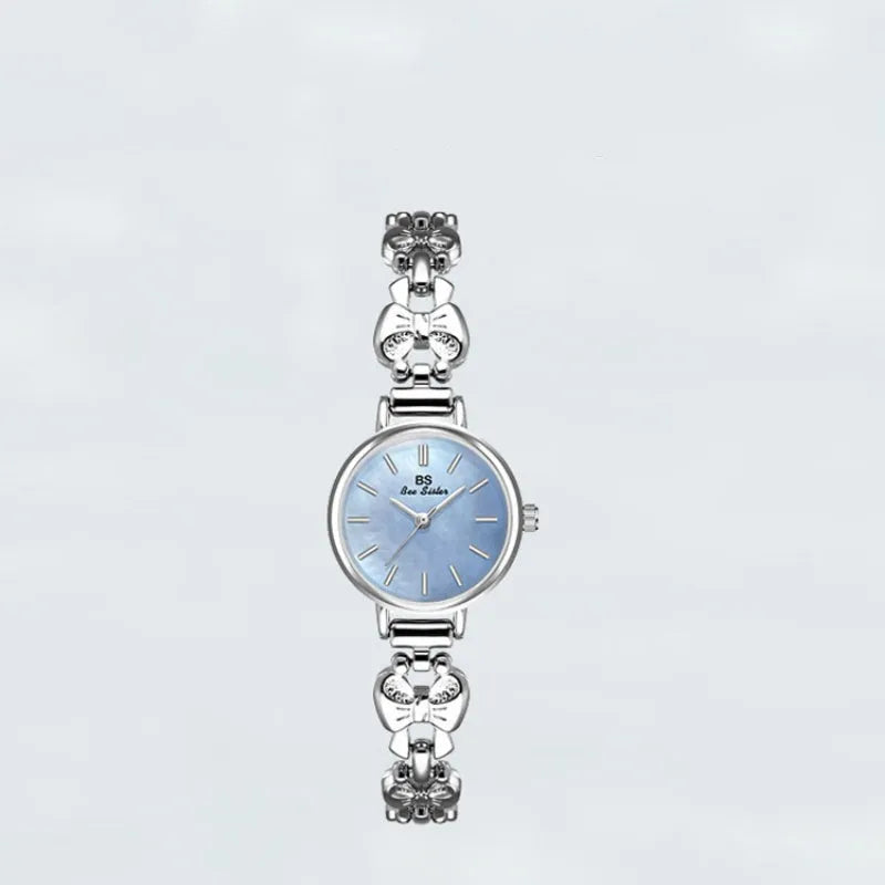 Women's retro French style alloy watch with 7mm slim case in golden white finish