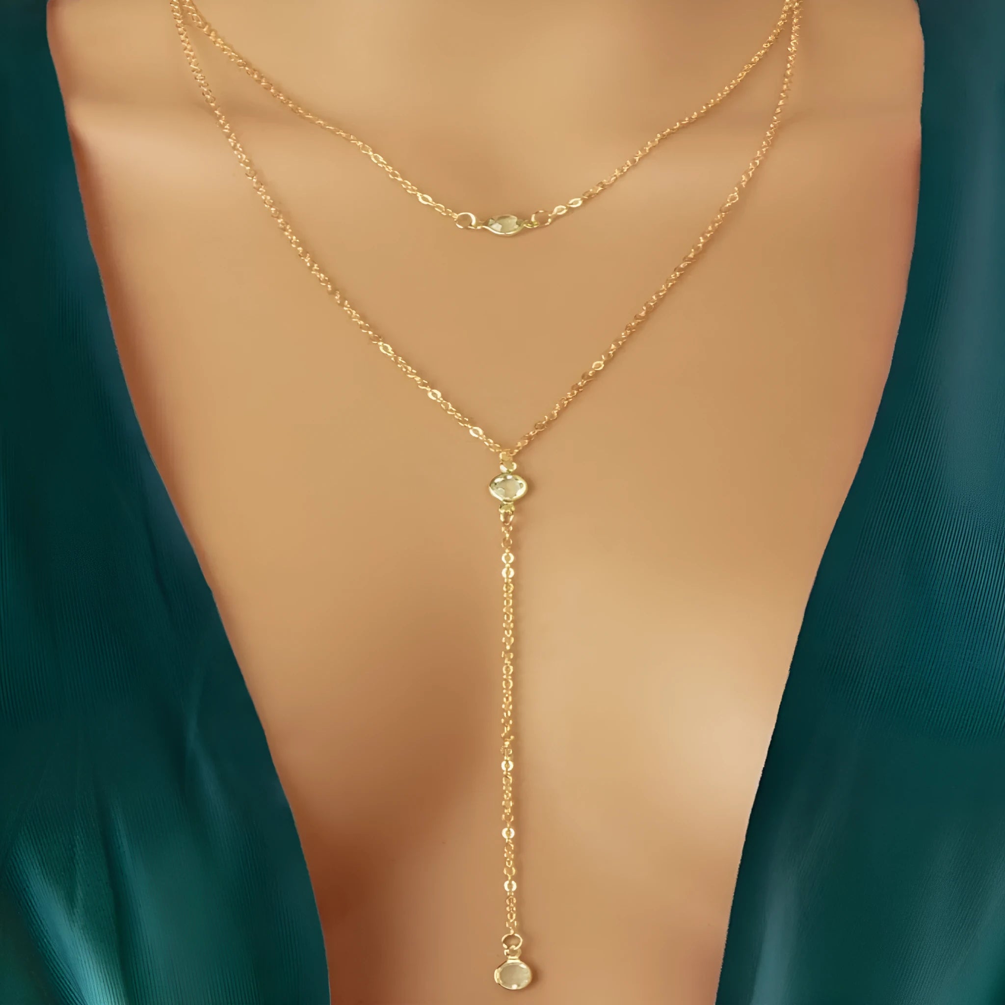 Alloy O-ring chain necklace with geometric pendant in gold finish on female neckline