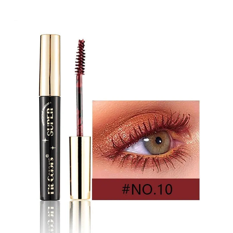 Colourful mascara tube and wand with vibrant shades for dramatic Christmas and stage eye makeup.