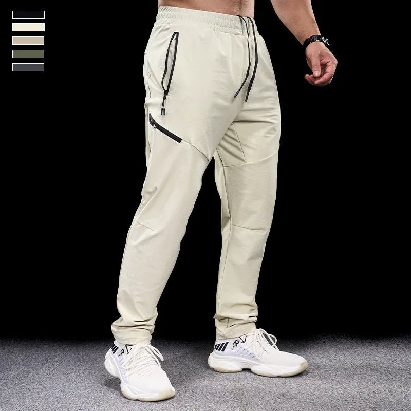 Men's waterproof workout pants in quick-drying nylon fabric for sports and fitness activities