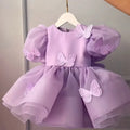 Girls western style princess dress in pink with frill details and bow on front, cotton blend fabric
