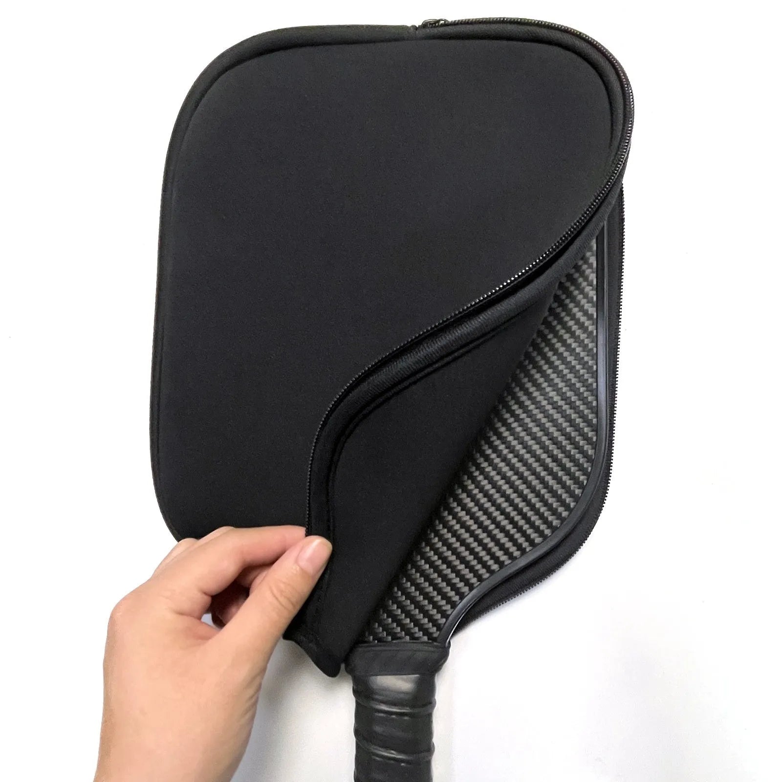 Black neoprene protective sleeve for a table tennis racket handle.