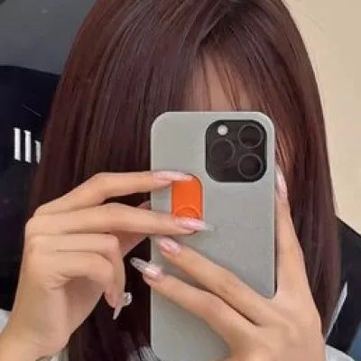 Bright yellow 3D printed sliding middle finger phone case for iPhone 14 Pro Max with spoof mechanism visible